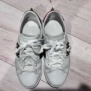 Gucci women’s pearl studded calfskin sneakers